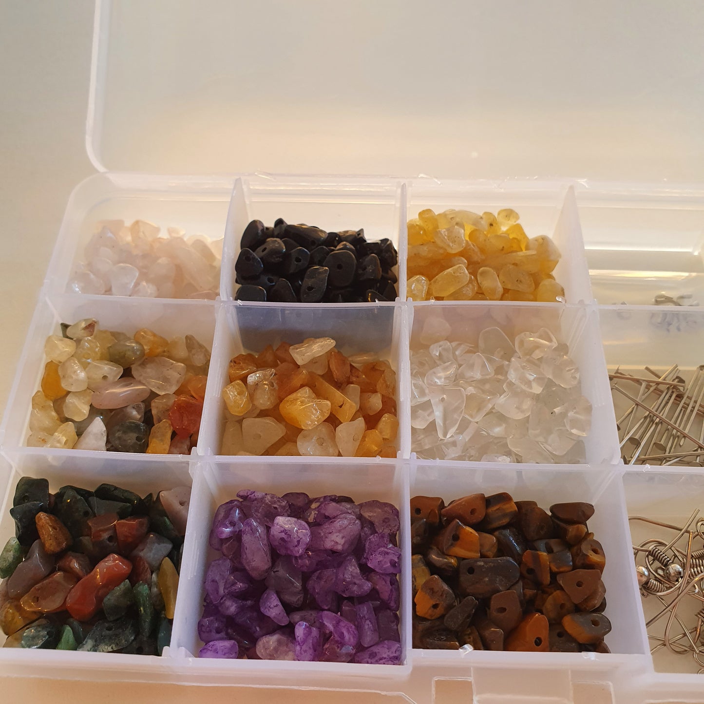 Box of semi-precious stones and small parts