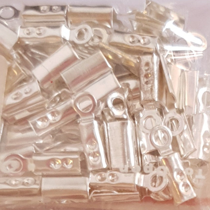 Terminals for costume jewelery (cable lug and knot cover)