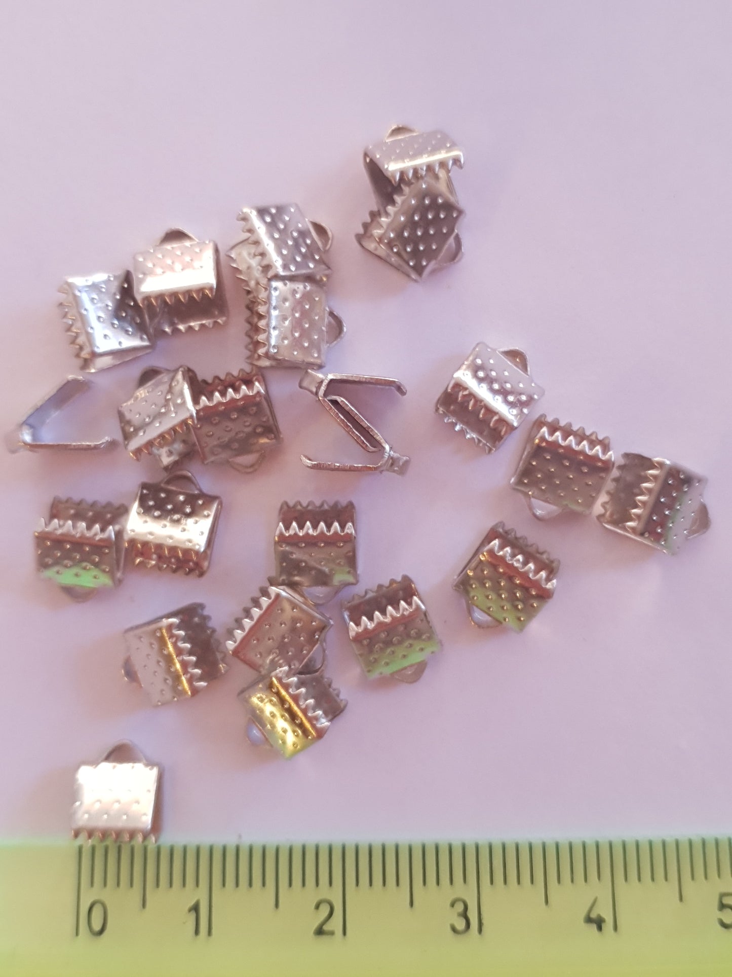 Terminals for ribbons, to create costume jewellery