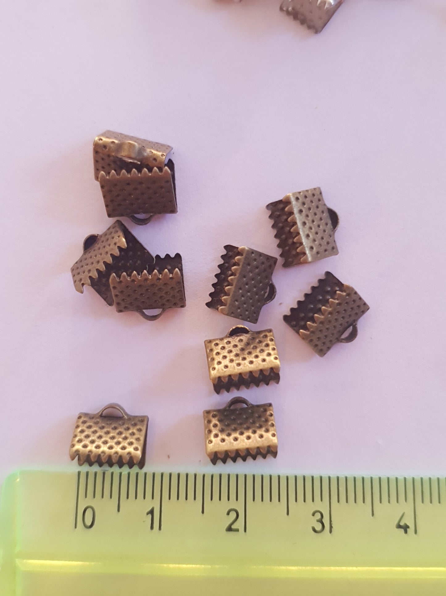 Terminals for ribbons, to create costume jewellery