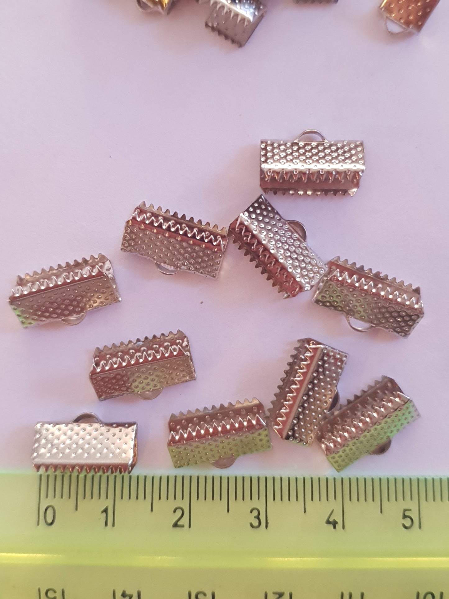Terminals for ribbons, to create costume jewellery