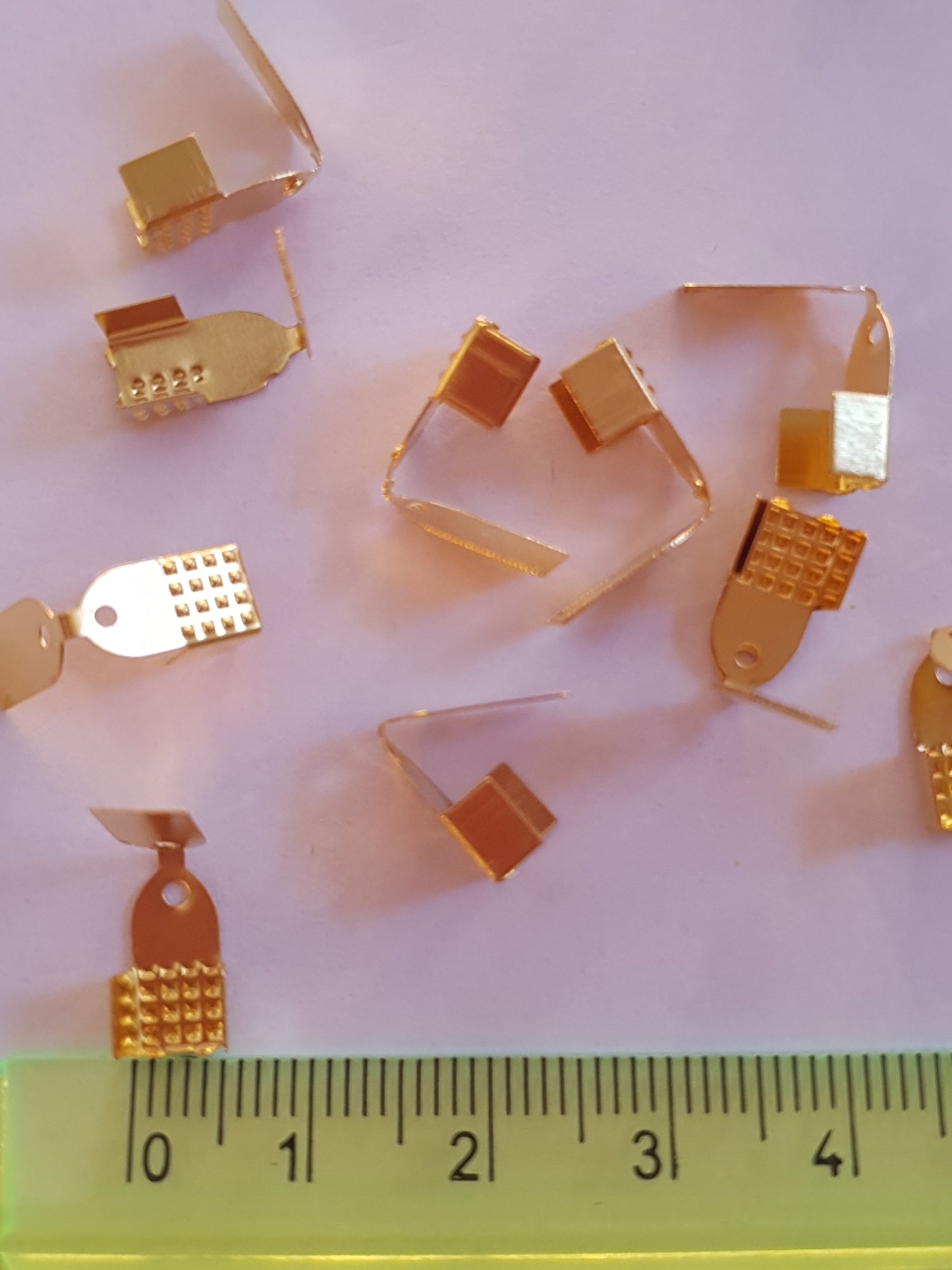 Terminals for ribbons, to create costume jewellery