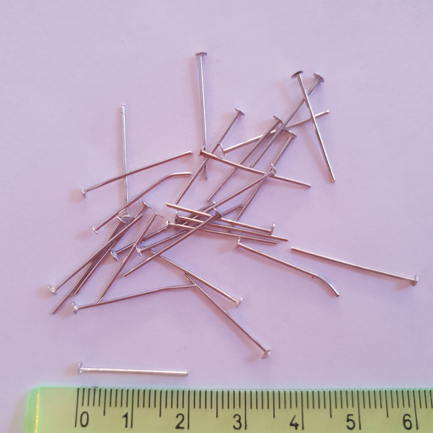 Nails for costume jewellery