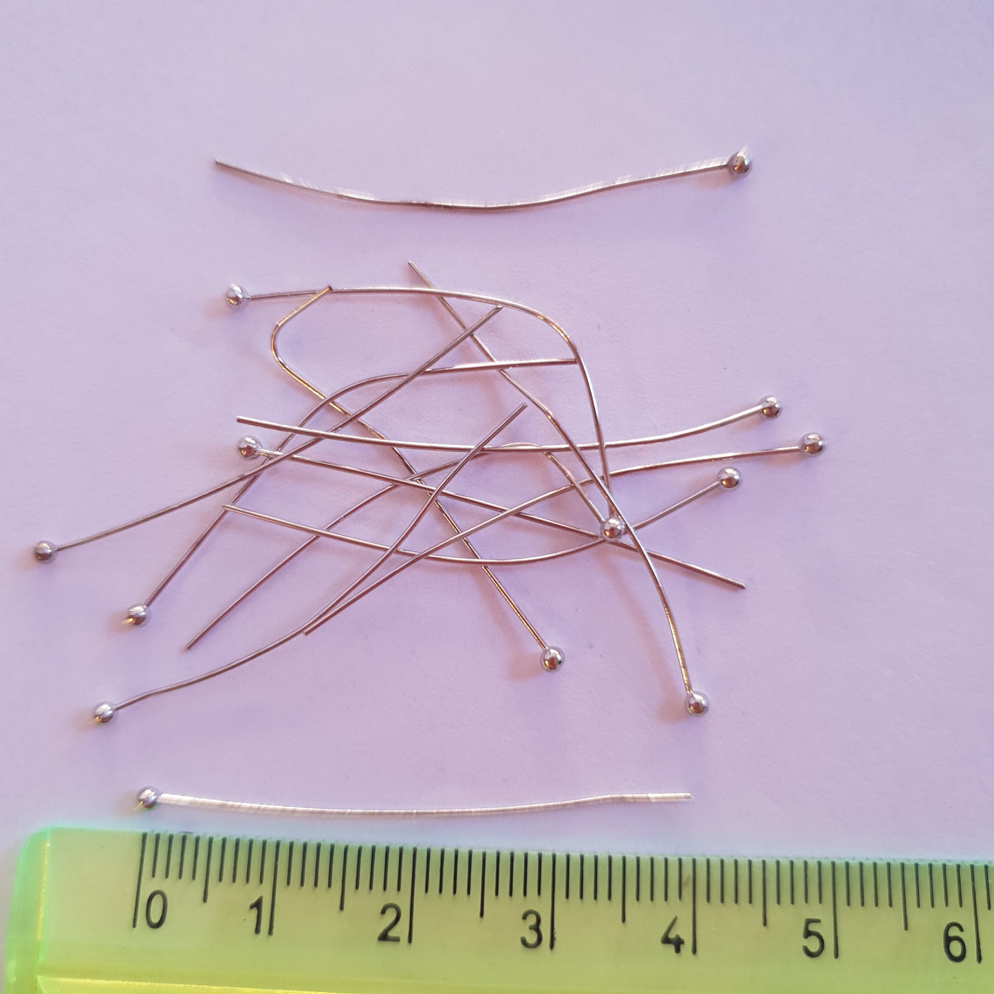 Nails for costume jewellery