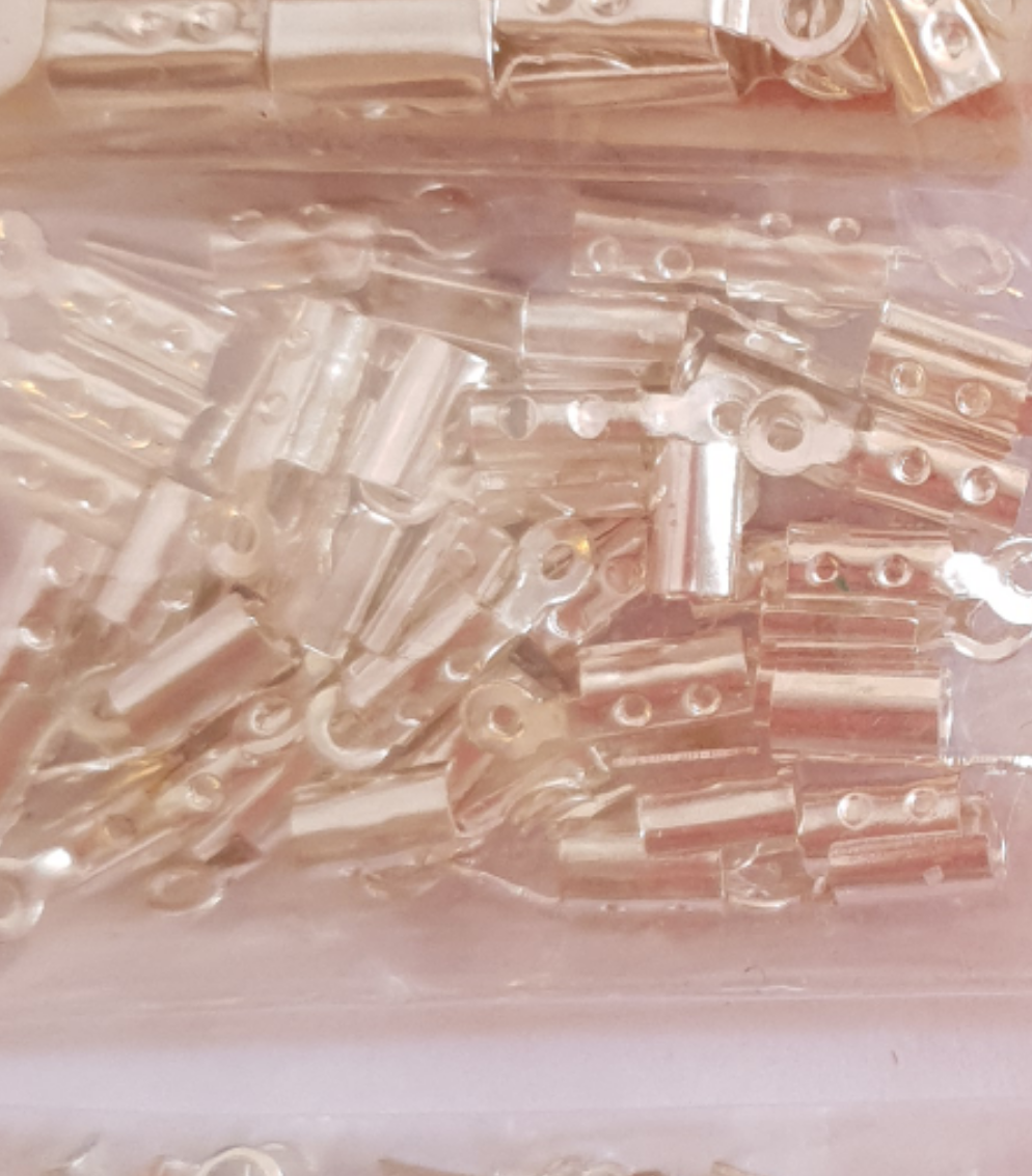 Terminals for costume jewelery (cable lug and knot cover)