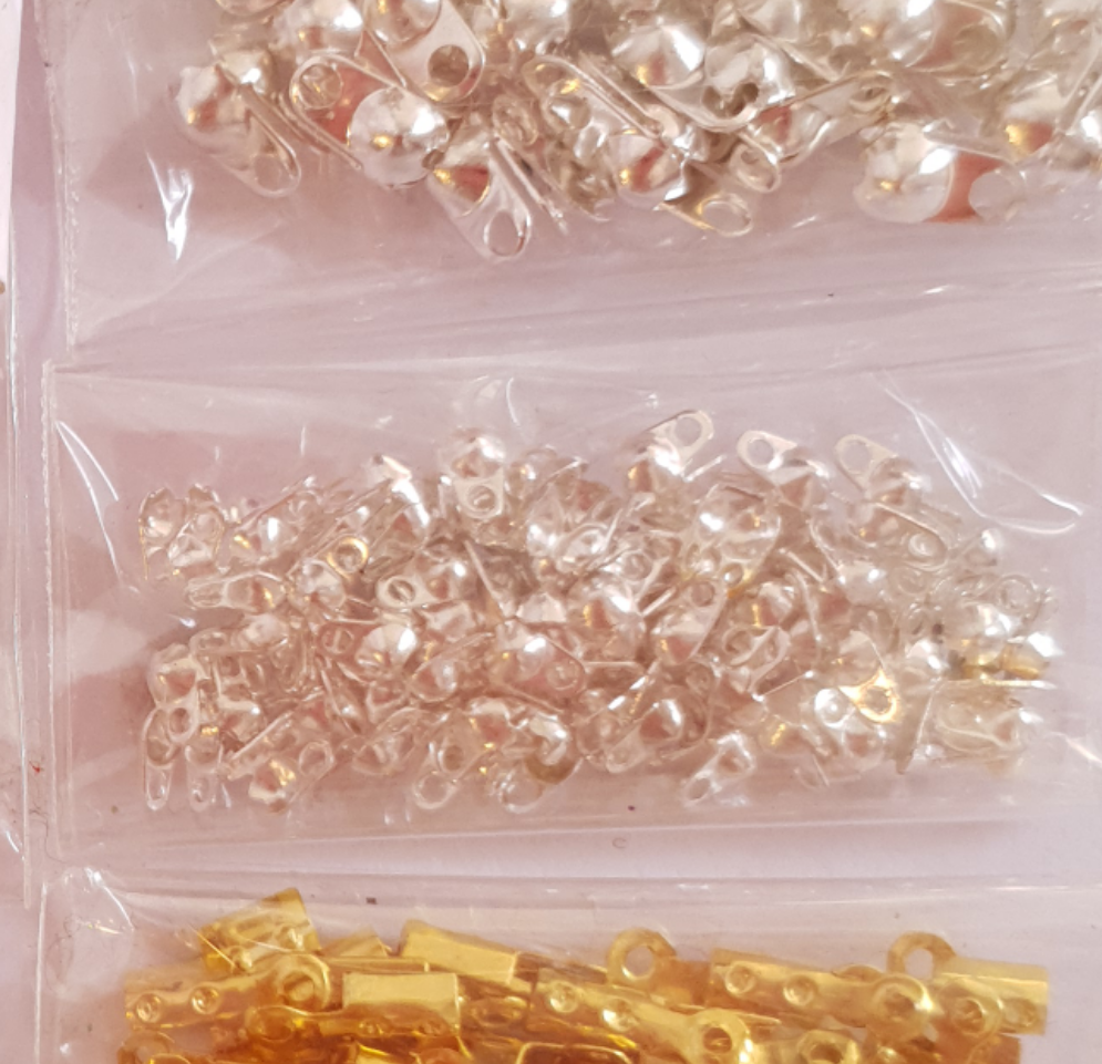 Terminals for costume jewelery (cable lug and knot cover)