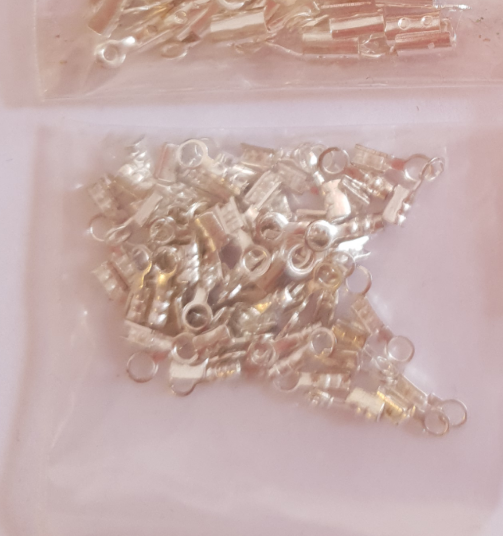 Terminals for costume jewelery (cable lug and knot cover)