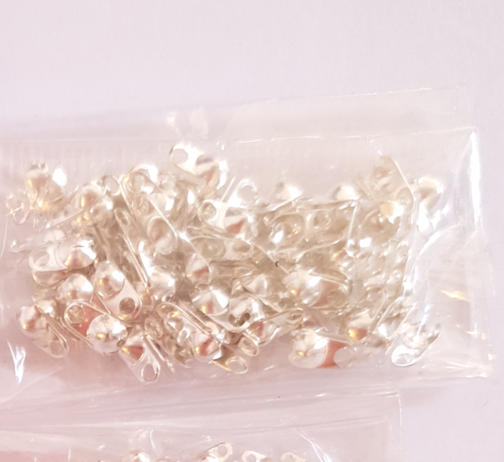 Terminals for costume jewelery (cable lug and knot cover)