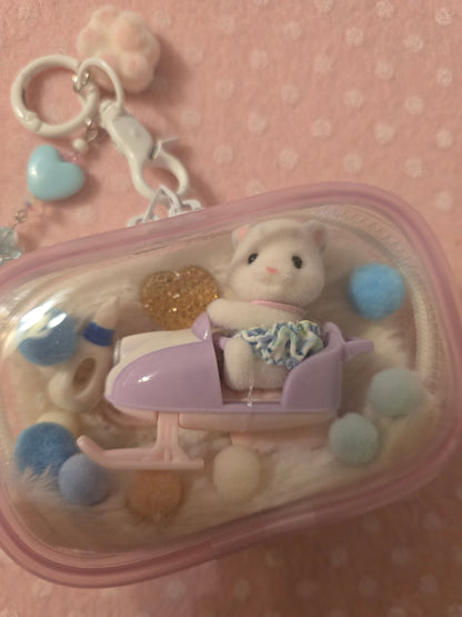 Sylvanian families bag charm leopardo delle nevi baby